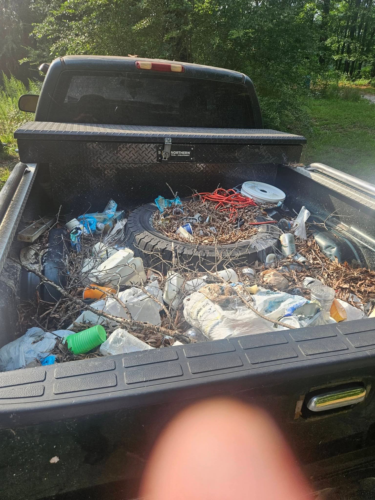 Clean driveway alternative to roll-off dumpsters in Mead