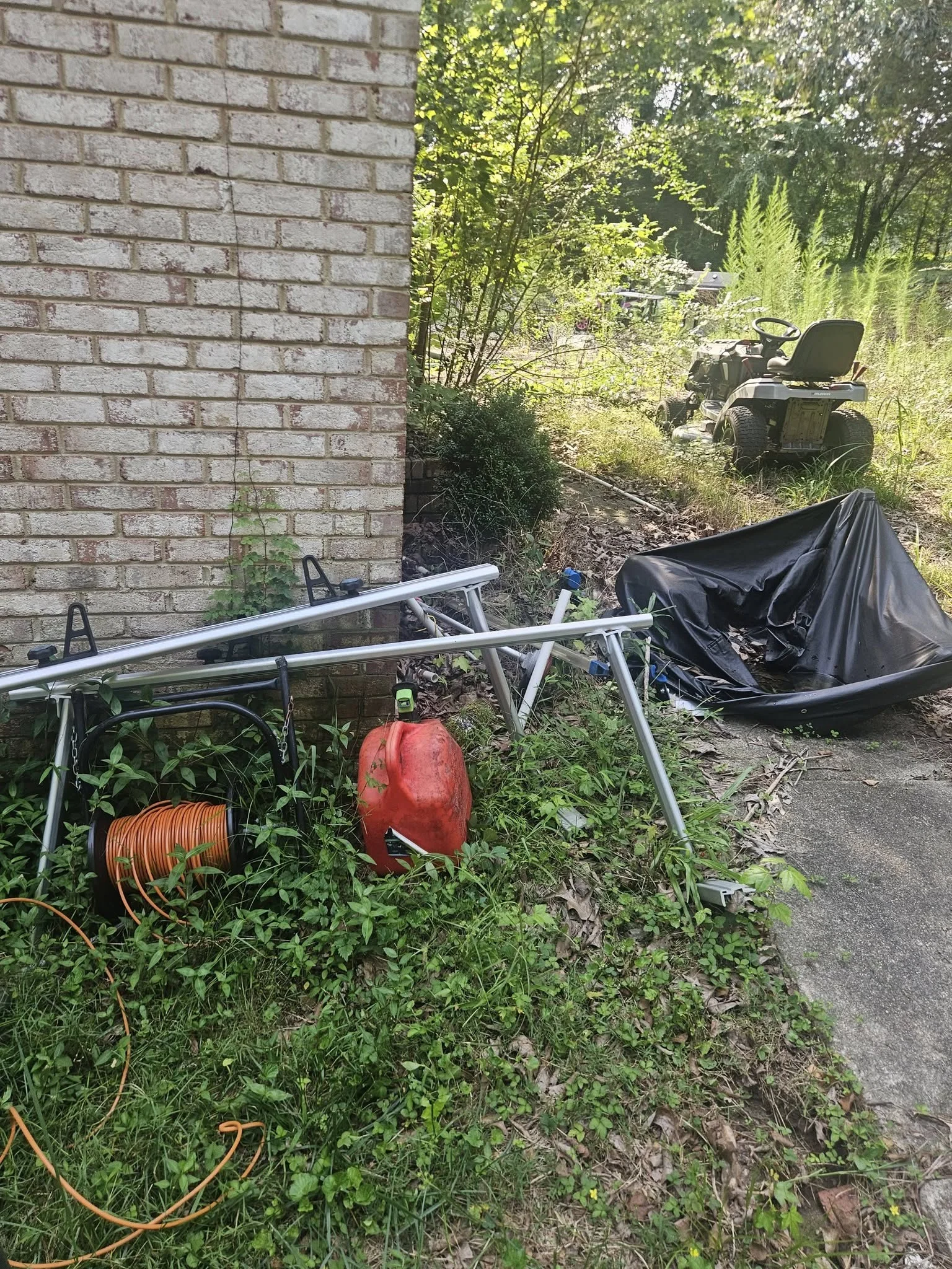 Outdoor Water Heater & Compressor Removal — Cheney