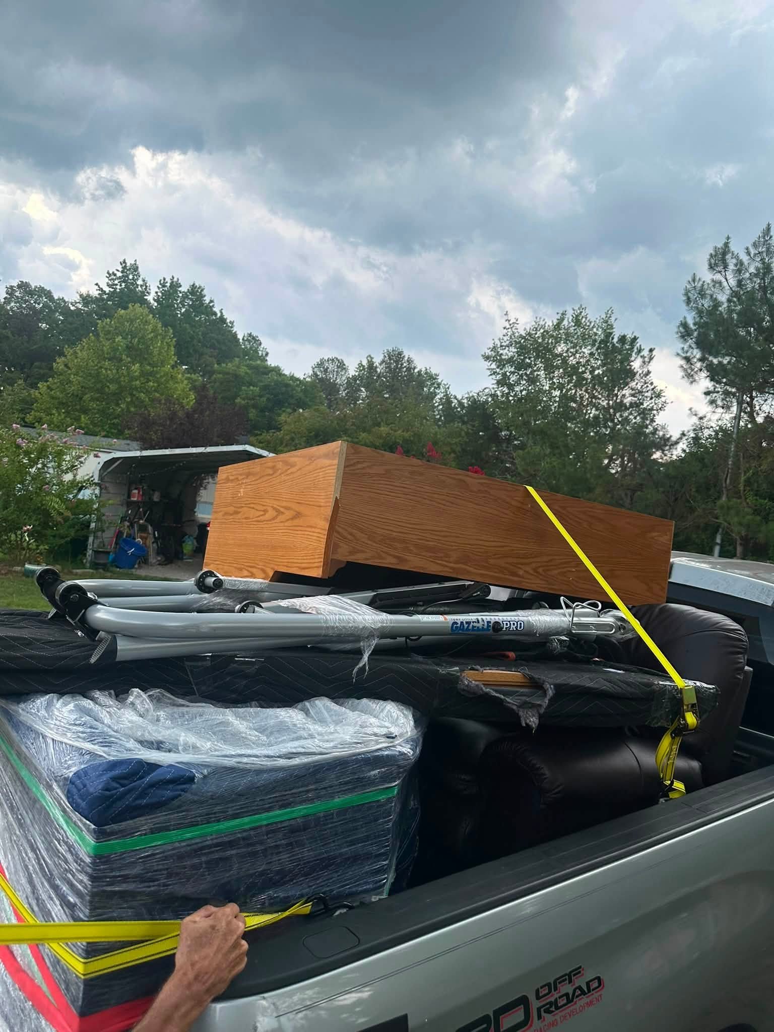 Spokane Junk Pros furniture hauling truck fully loaded and ready to drive